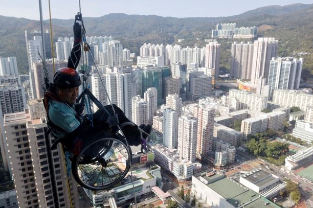 Paraplegic Climbing Skyscraper In Hong Kong